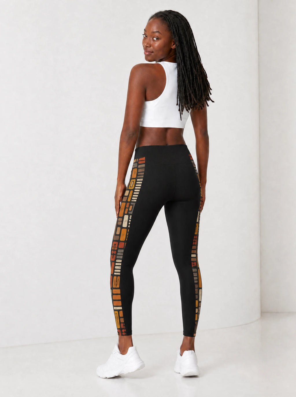 "Ufundi" Leggings — back view on model