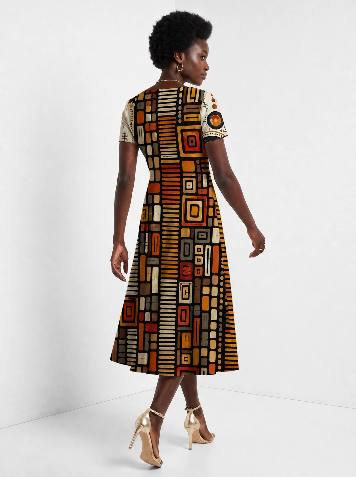 "Ufundi" Sweetheart Midi Dress — back view on model