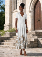 "Ukungu" Short Sleeve Maxi Dress — front view on model in the churchyard