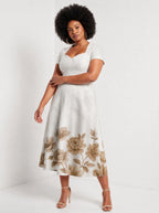 "Ukungu" Sweetheart Midi Dress — walking, three-quarter view on model