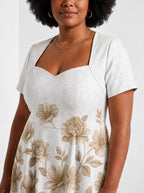 "Ukungu" Sweetheart Midi Dress — three-quarter view on model