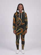 "Upepo" Hoodie Dress — front view on model, styled with the matching leggings