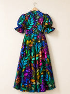 "Upinde" Puff Sleeve Dress — the dress on a hanger, back