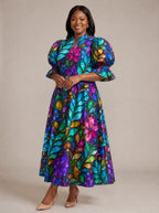 "Upinde" Puff Sleeve Dress — walking, three-quarter view on model