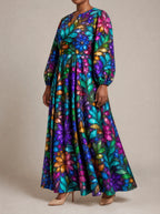"Upinde" Puff Sleeve Maxi Dress — three-quarter view on model