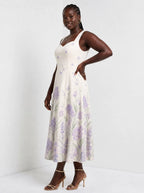 "Urujuani" Corset Dress — three-quarter view on model