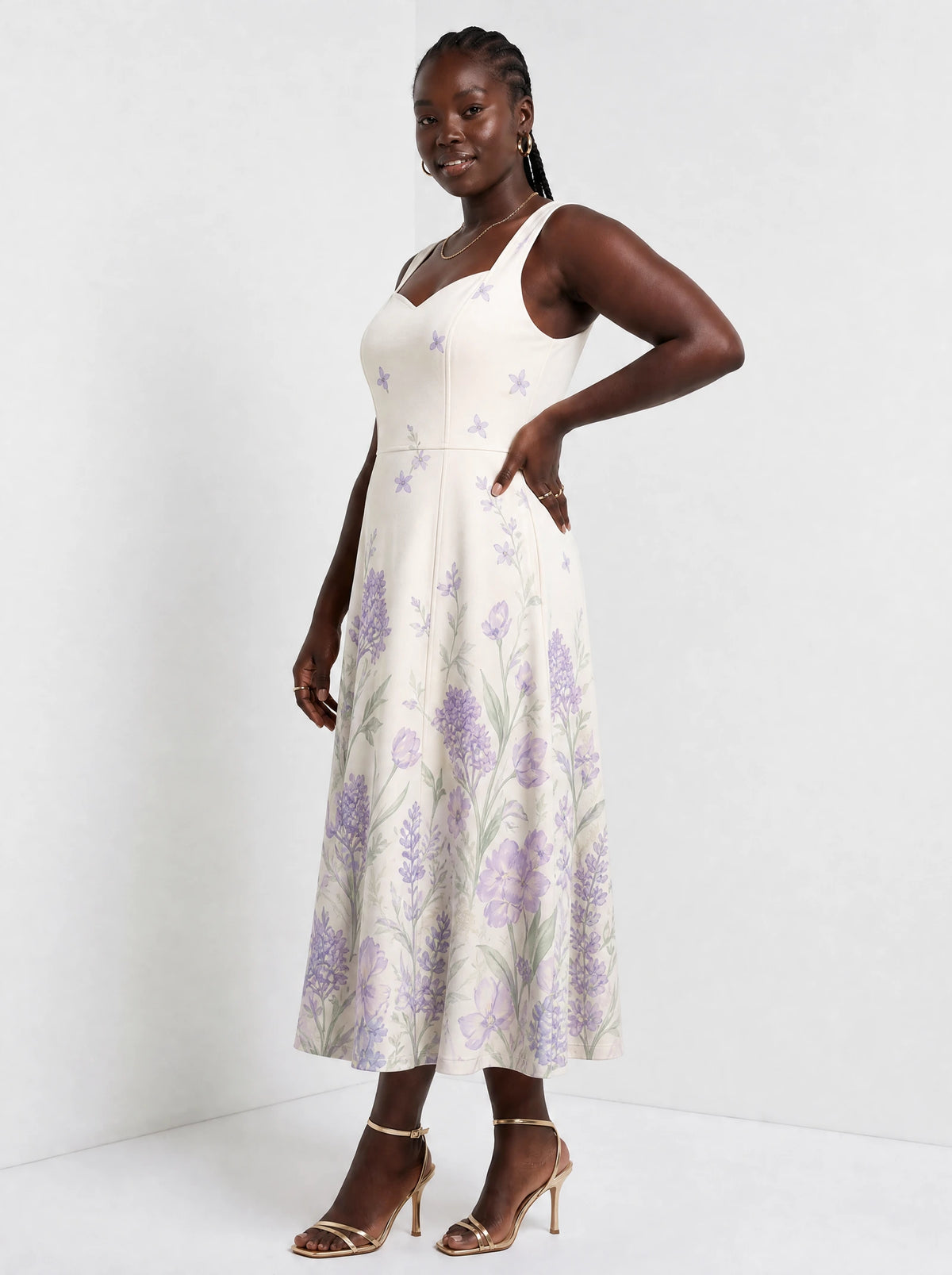 "Urujuani" Corset Dress — three-quarter view on model