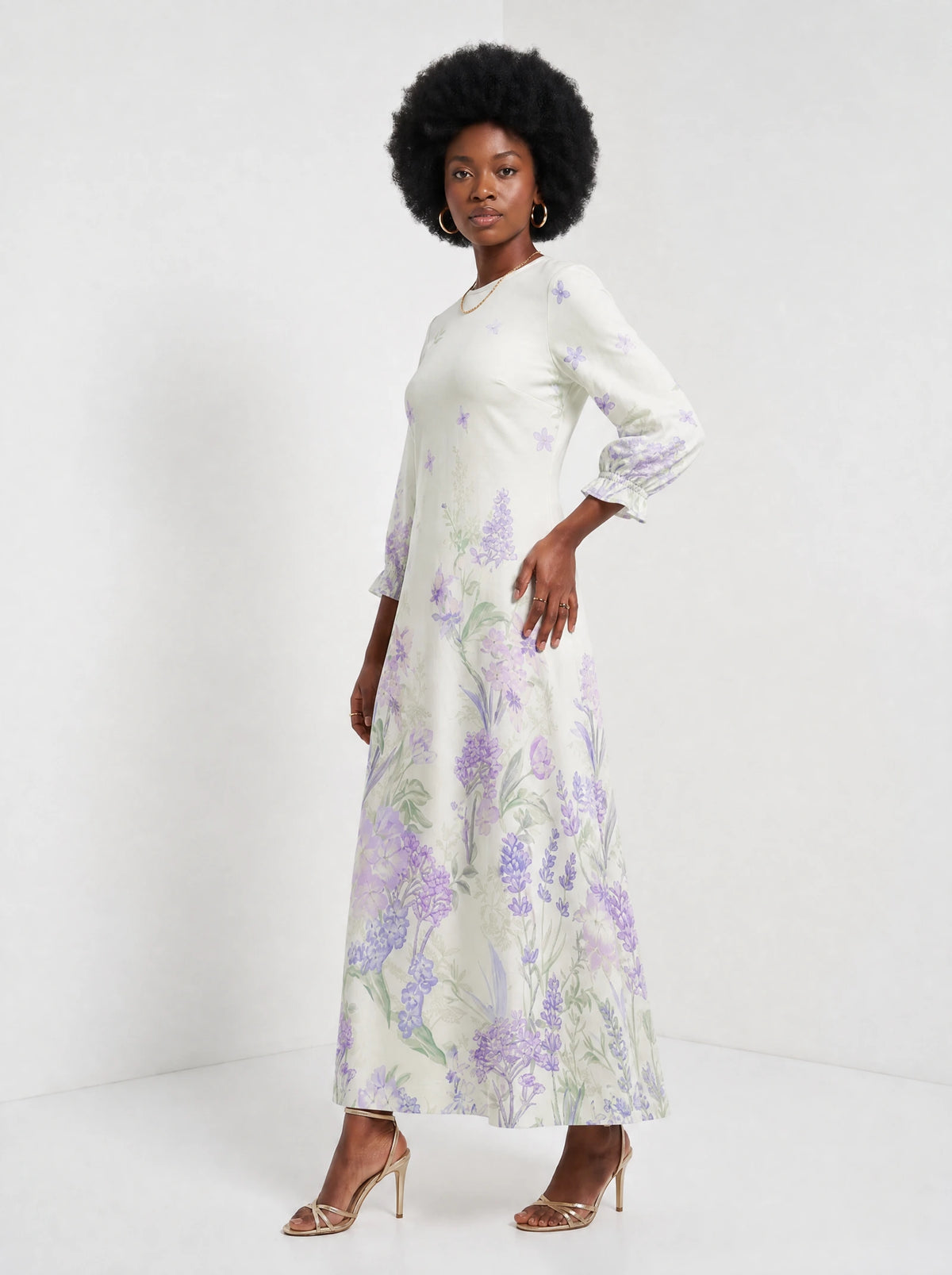 "Urujuani" Long Sleeve Maxi Dress — three-quarter view on model