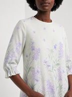 "Urujuani" Long Sleeve Maxi Dress — close-up of the high round neckline