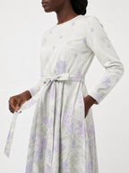 "Urujuani" Long Sleeve Midaxi Dress — close-up of the tie sash and the in-seam side pocket