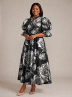 "Usiku" Puff Sleeve Dress — walking, three-quarter view on model