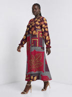 "Vuli" Long Sleeve Maxi Dress — three-quarter view on model