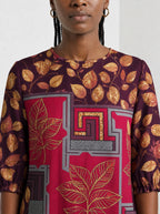 "Vuli" Long Sleeve Maxi Dress — close-up of the high round neckline