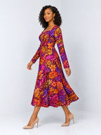 "Waridi" Long Sleeve Sweetheart Midi Dress — side view on model