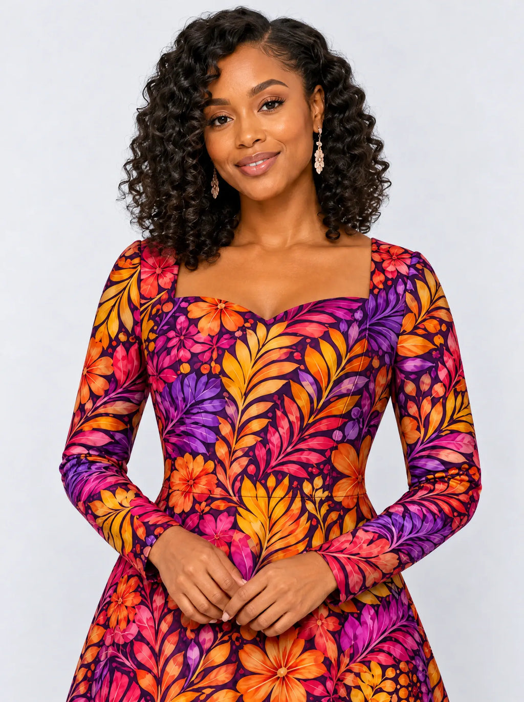 "Waridi" Long Sleeve Sweetheart Midi Dress — print close-up on model