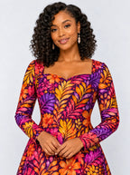 "Waridi" Long Sleeve Sweetheart Midi Dress — print close-up on model