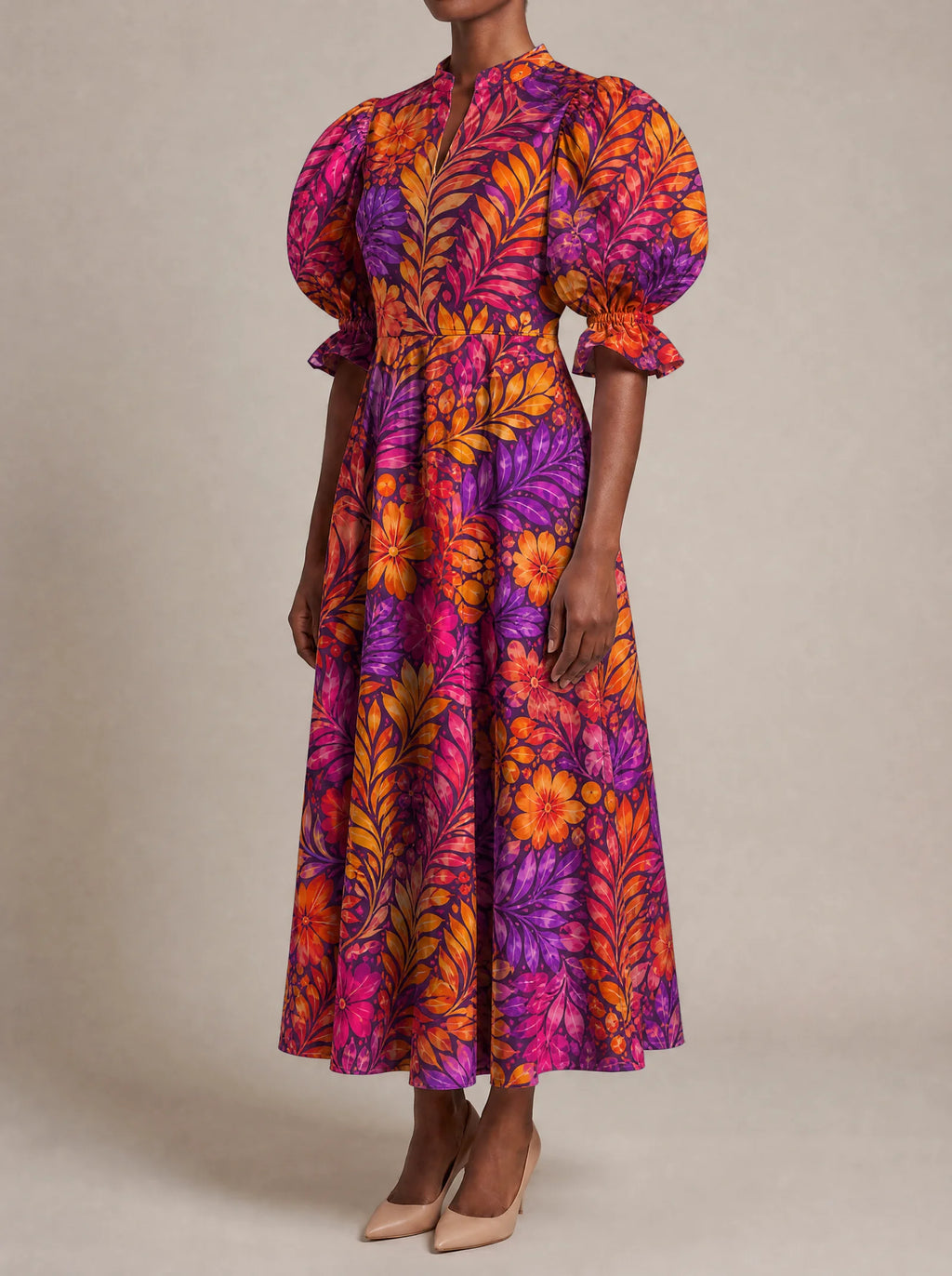 "Waridi" Puff Sleeve Dress — three-quarter view on model