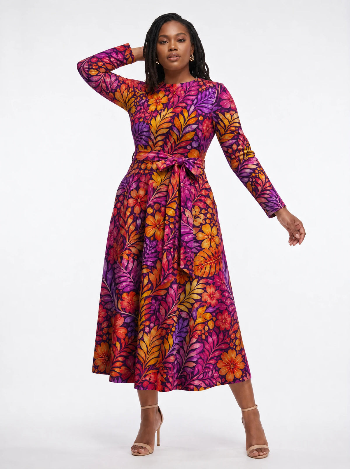 "Waridi" Long Sleeve Midaxi Dress — three-quarter view on model, hand in the side pocket