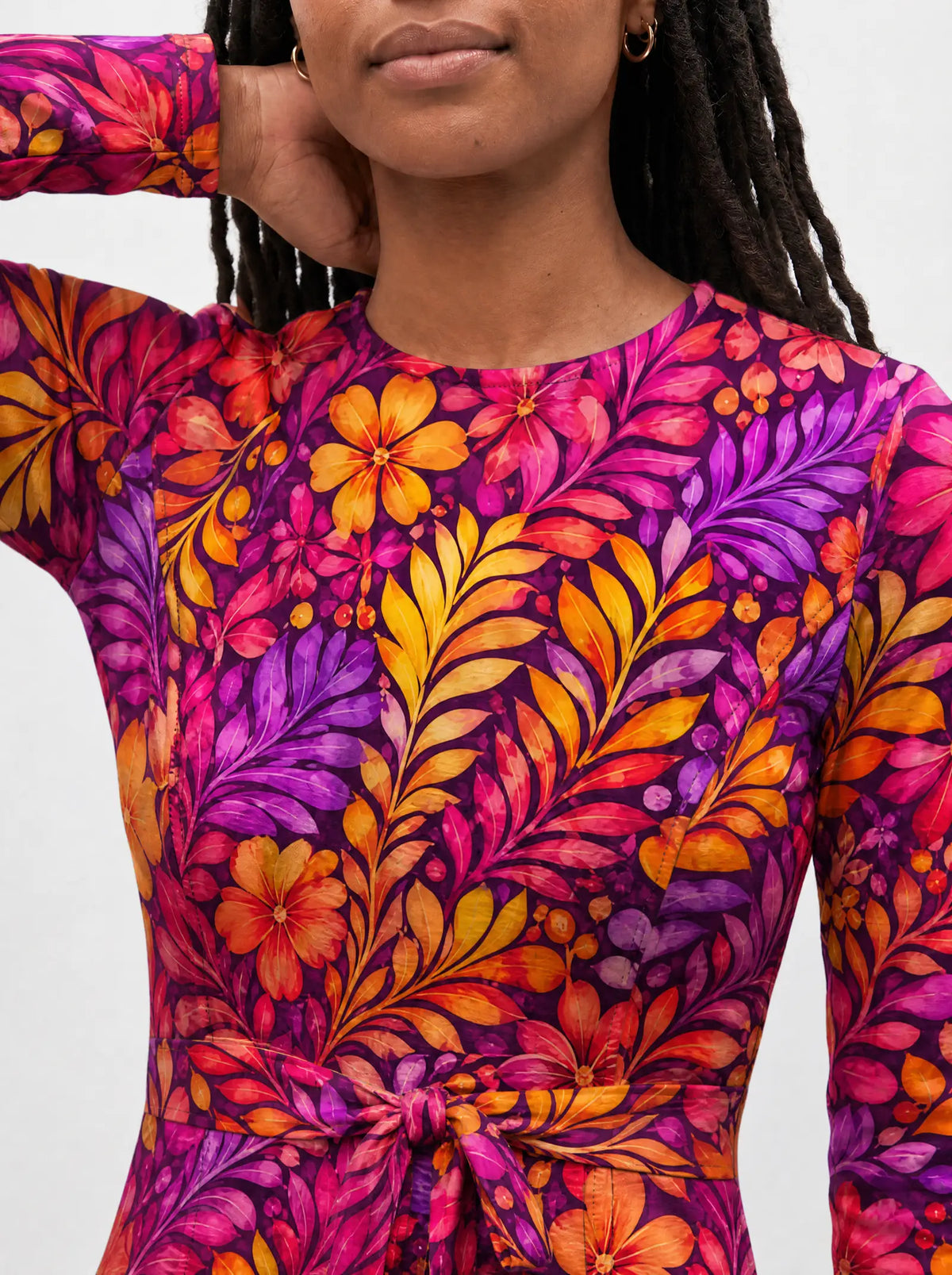 "Waridi" Long Sleeve Midaxi Dress — close-up of the round neckline and long sleeve