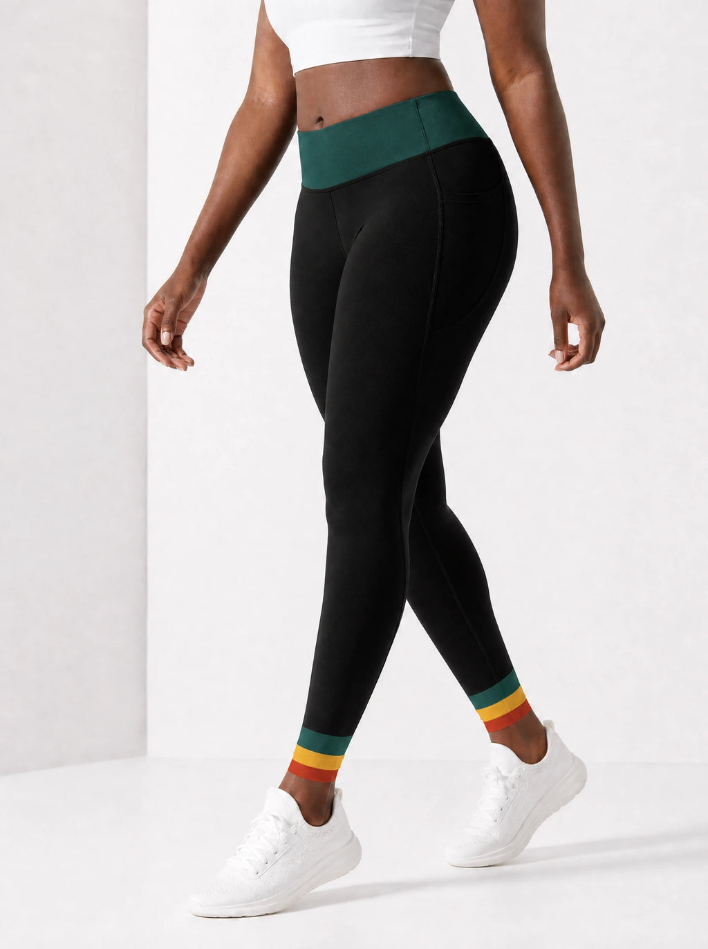 "Weusi" Leggings — side view on model, walking
