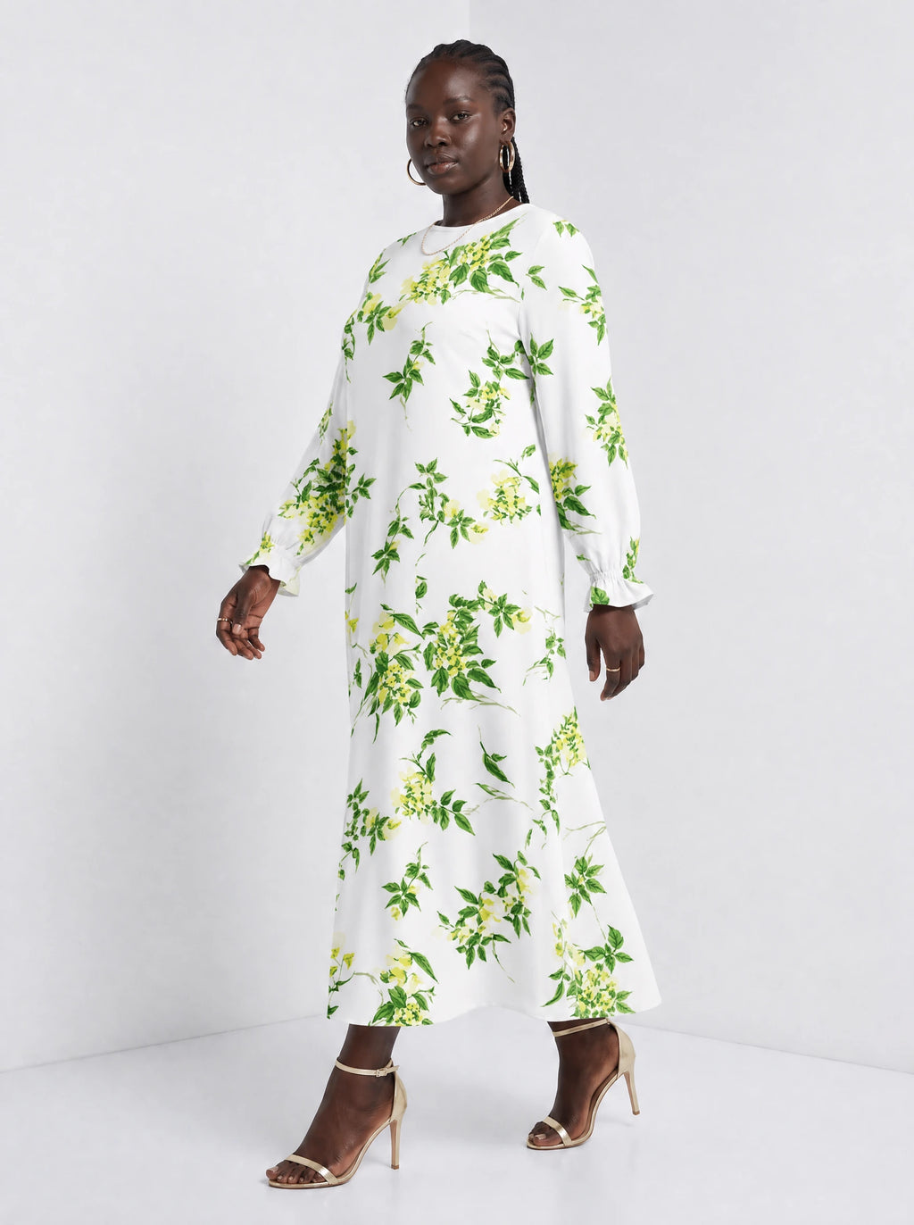 "Yasmini" Long Sleeve Maxi Dress — three-quarter view on model