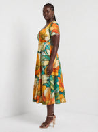 "Zafarani" Sweetheart Midi Dress — side view on model