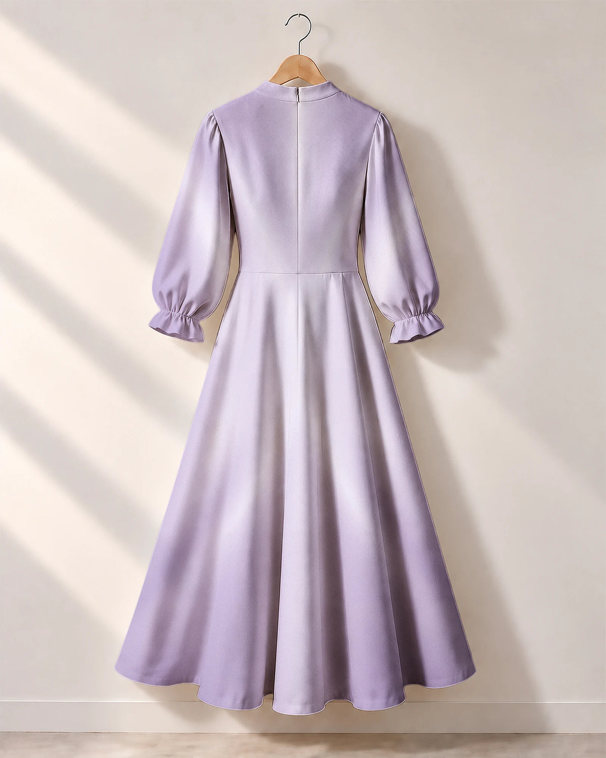 "Zambarau" Long Puff Sleeve Dress — the dress on a hanger, back