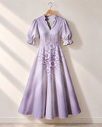"Zambarau" Puff Sleeve Dress — the dress on a hanger, front