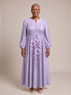 "Zambarau" Puff Sleeve Maxi Dress — standing, angled view on model