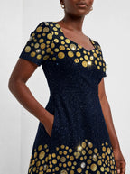 "Zawadi" Sweetheart Midi Dress — standing, angled view on model