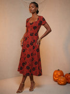 "Zimwi" Halloween Sweetheart Midi Dress — three-quarter view on model
