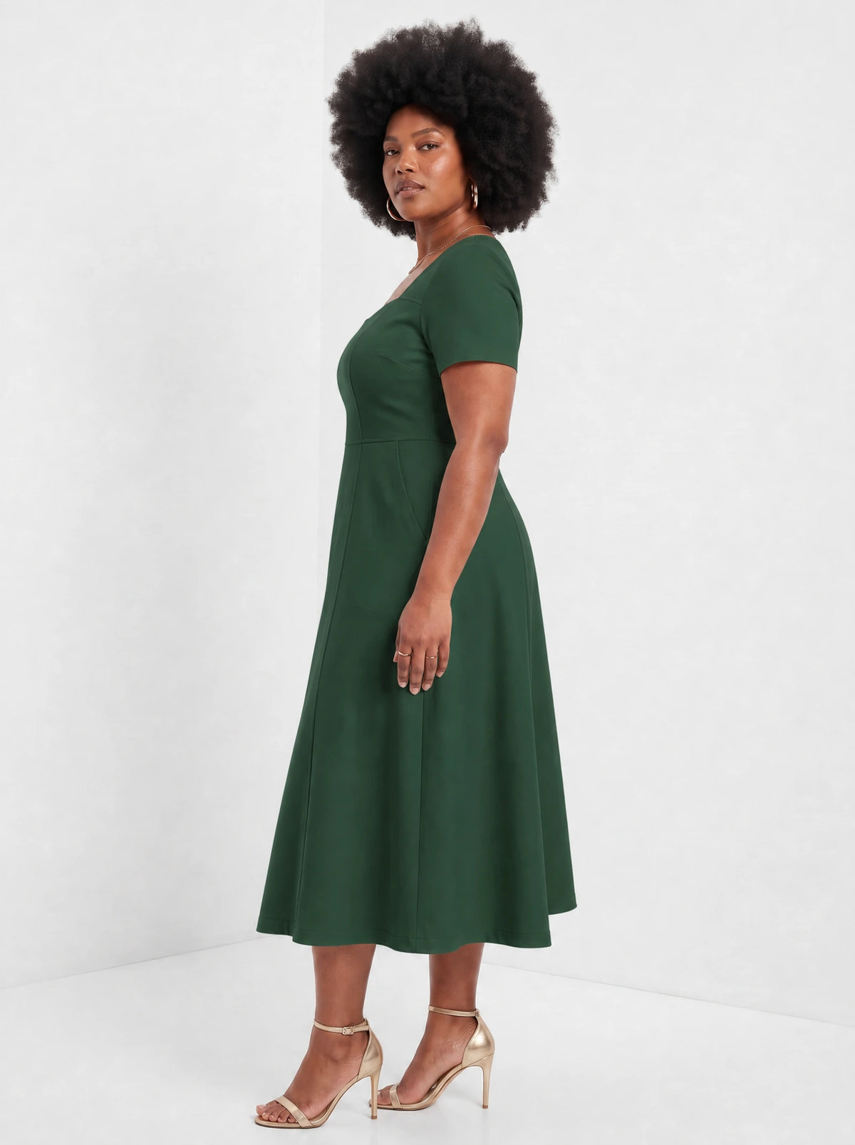 "Zuhura" Sweetheart Midi Dress — side view on model