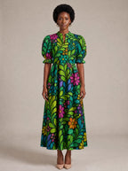 "Zumaridi" Puff Sleeve Dress — standing, angled view on model