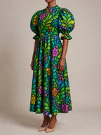 "Zumaridi" Puff Sleeve Dress — three-quarter view on model