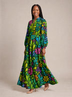 "Zumaridi" Puff Sleeve Maxi Dress — walking, three-quarter view on model
