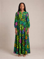 "Zumaridi" Puff Sleeve Maxi Dress — standing, angled view on model