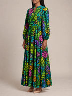"Zumaridi" Puff Sleeve Maxi Dress — three-quarter view on model