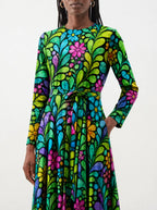 "Zumaridi" Long Sleeve Midaxi Dress — close-up of the tie sash and the in-seam side pocket