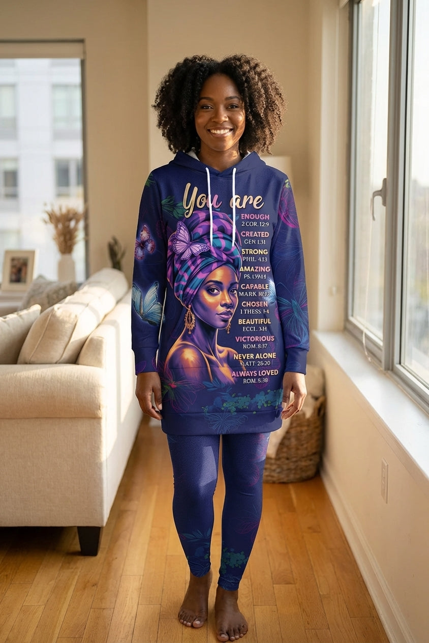 Woman wearing Afropenda Blue Orchid Hoodie Dress and Leggings